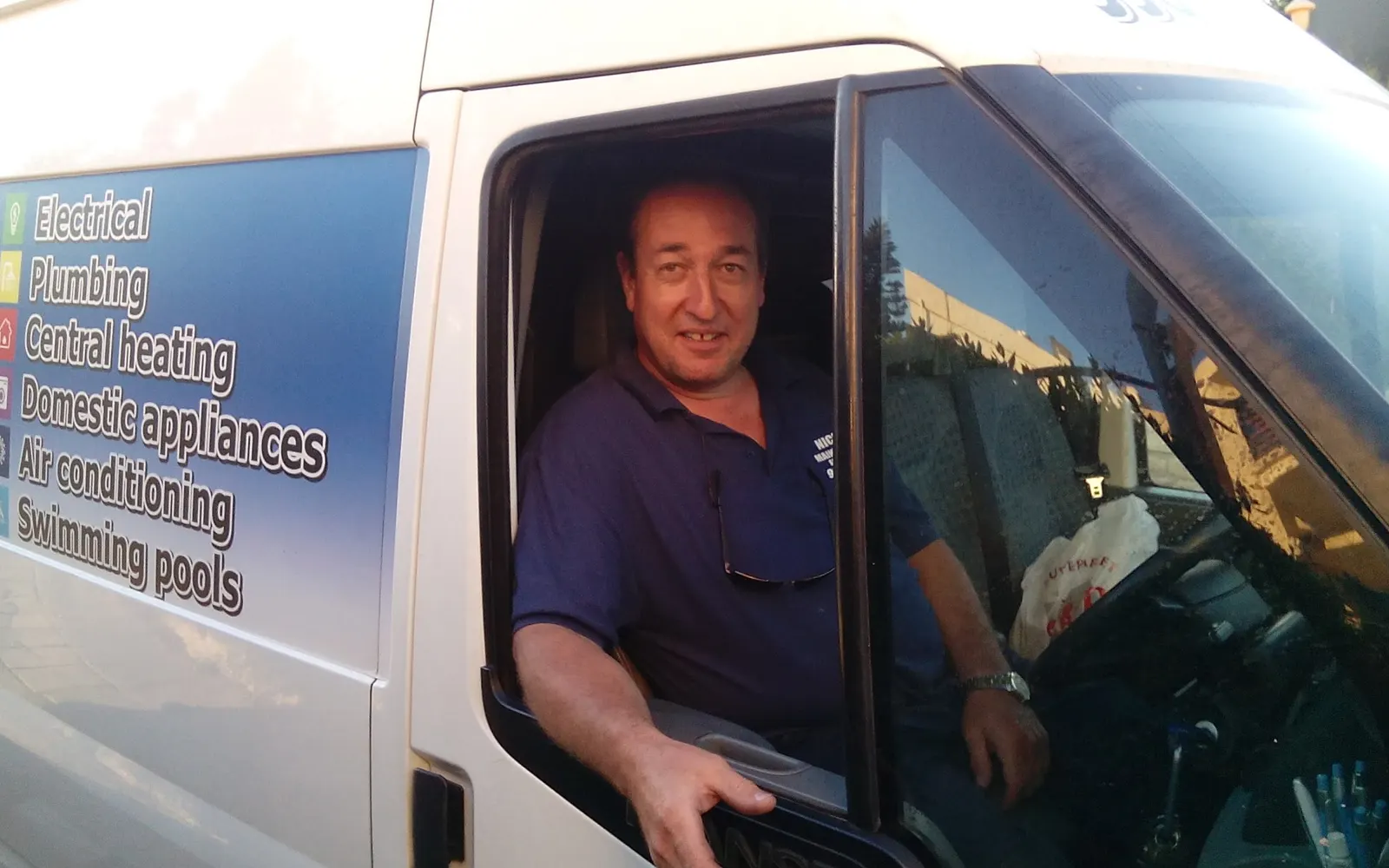 Nick, the founder, in the window of his van